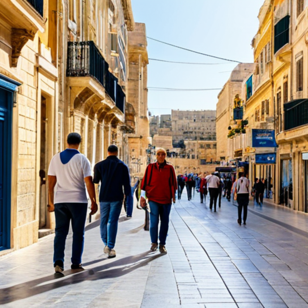 몰타 3대 도시 관광 - Valletta Street Scene**

"A vibrant street scene in Valletta, Malta, featuring honey-colored buildin...